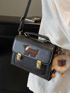 Classic black PU leather messenger bag with dachshund embroidery and cute plush pendant