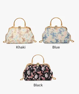 Detailansicht von Retro-Abendtaschen mit Blumenstickerei und goldenen Metallgriffen