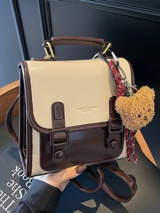 Vintage color-block messenger bag with cute bear charm and adjustable shoulder straps