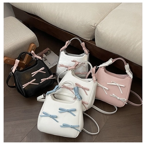 Collection of hobo bags with bows in black, silver, white and pink colors