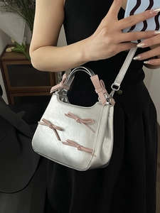 Silver square handbag with pink bows and metal leather texture for women stylish look
