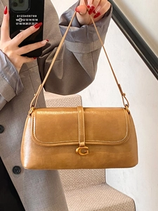 Minimalist camel leather underarm bag with iconic golden G-buckle for office wear