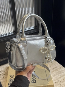 Silver oil wax leather Boston bag with pearl bow charm and heart metal pendant