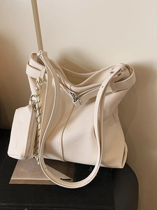 Chic off-white large capacity hobo bag in textured faux leather with small coin pouch