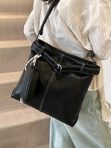 Stylish black large-capacity denim style tote bag with contrast stitching and shoulder strap