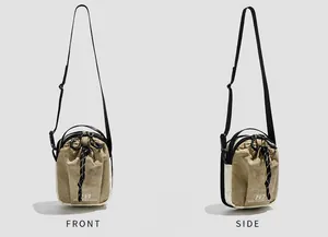 Detail view of khaki nylon crossbody phone bag showing front and side functional designs