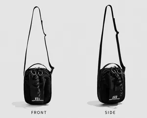 Macro detail of black nylon functional crossbody bag showing drawstring and zipper pouch