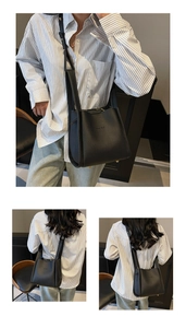 Detail of black litchi grain leather bucket bag with metallic feet and adjustable strap
