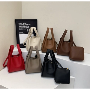 Litchi texture leather bucket bags in multiple colors with handles and straps