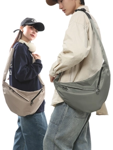 Minimalist nylon crescent crossbody bag set in khaki and grey-green with wide straps