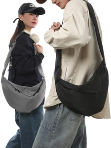 Minimalist nylon crescent crossbody bag in charcoal grey and black for men and women