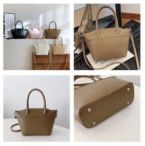 Detail of elegant bucket bag showing bottom metal feet and five color variants in soft leather
