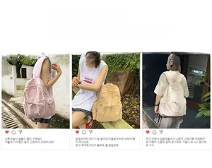 Outdoor lifestyle view of minimalist nylon school backpacks in pink, khaki, and beige
