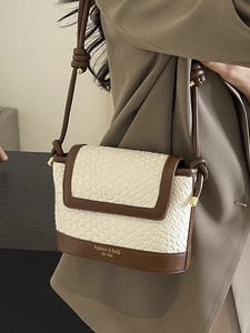 Sac seau tissé mode en crème et blanc avec bordure en cuir marron et bandoulière nouée