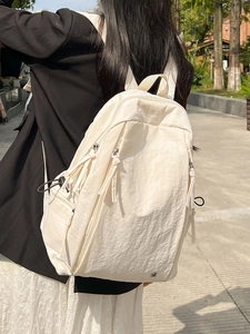 Minimalist large capacity off-white nylon backpack with multi-pocket functional design