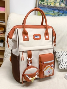 Sac à dos bicolore minimaliste avec de multiples poches et grande capacité de stockage