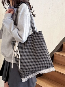 Japanese style black and white plaid tote bag with white lace trim and ribbon bow