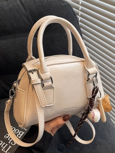 Vintage cream white bowling bag with baseball charm accessories and leather strap