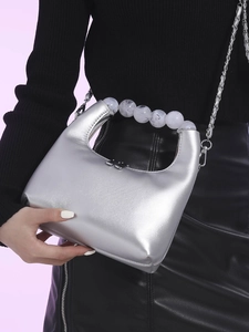 Metallic silver hobo bag with large beaded handle and chain strap for women