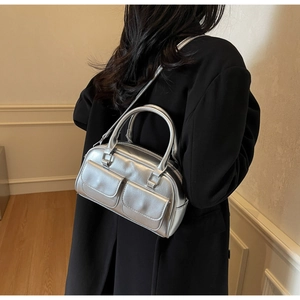 Silver oil wax leather Boston bag with metallic finish and front flap pockets for women