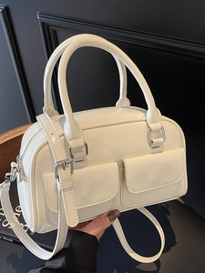Elegant creamy white oil wax leather Boston bag with double pockets and silver hardware