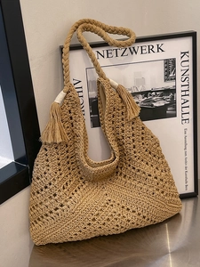 Bohemian hollow straw tote bag with tassel rope handles for summer beach holidays