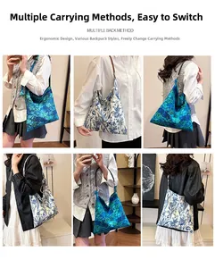 Detail of floral embroidery and blue porcelain patterns on soft fabric tote bag