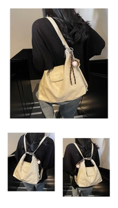 Detail view of beige soft leather tote bag showing convertible shoulder and backpack straps