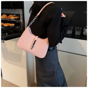 Pink woven hobo bag with iconic silver piston clasp and chain strap detail