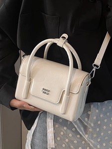 Minimalist cream white vintage structured square handbag with dual handles and crossbody strap