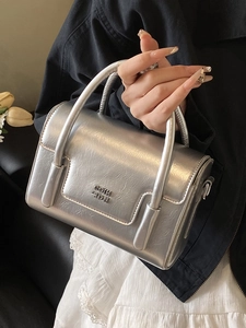 Chic silver square handbag in oil wax leather with metallic finish and top handles