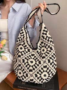 Ethnic handmade crochet tote bag with black and white hollow floral knit pattern