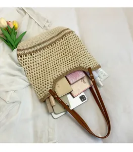 Macro shot of woven crochet tote bag showing spacious interior and contrast trim