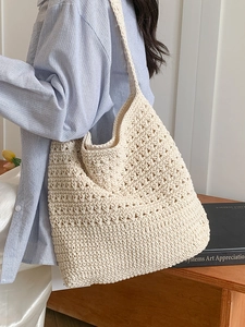 Elegante borsa tote in crema lavorata a mano con trama intrecciata minimalista da donna