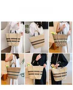 Detail showing the striped woven texture and black handles of this large tote beach bag