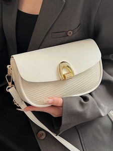 Elegant off-white leather and straw crossbody bag with golden metal U-shaped buckle
