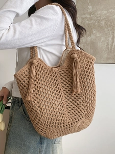 Handmade crochet woven tote bag in khaki with tassels for beach or casual outings