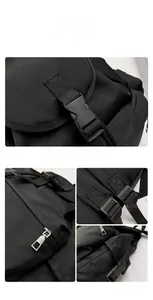 Close-up of black nylon backpack featuring durable plastic buckles and metal zippers