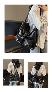 Detail of black faux oil wax leather hobo bag featuring front buckle pockets and wide strap