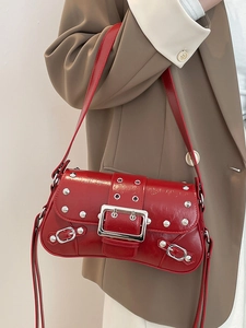 Bright red rivet punk style baguette bag with silver metal buckles for cool girls