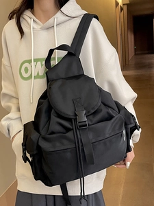 Fashionable black utility backpack with multi-pocket design for travel and commute