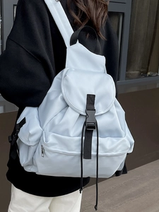 Minimalist large capacity light blue backpack for women, perfect for daily commuting and travel