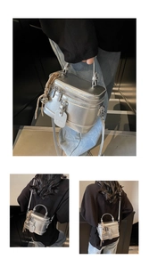 Detailed views of a silver box-shaped handbag with tassel charm and leather brand tag