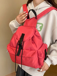 Pink waterproof nylon backpack for women showing a stylish casual commuter style