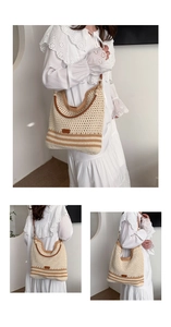 Detail of bohemian woven shoulder bag featuring beige knit textures and brown leather handles