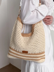 Chic hollow woven shoulder bag with wood bead accents and contrast knit texture