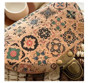 Close-up of cork crossbody bag featuring colorful mandala prints and vintage bronze lock