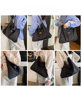 Multiple views of a large black denim hobo tote bag worn by models in daily settings