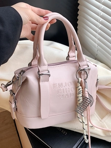 Pink soft leather boston bag with top handles and adjustable strap for women
