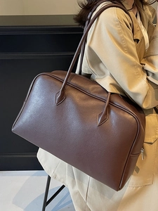 Minimalist large brown leather tote bag with pebble texture for women's daily commute
